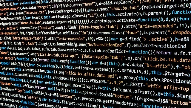 Bildschirm mit Programmierungstext / screen showing coding code