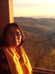 woman in front of a landscape